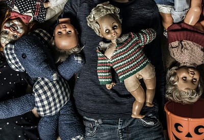 Creepy children with scary dolls